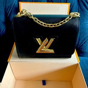Louis Vuitton purse … black and gold